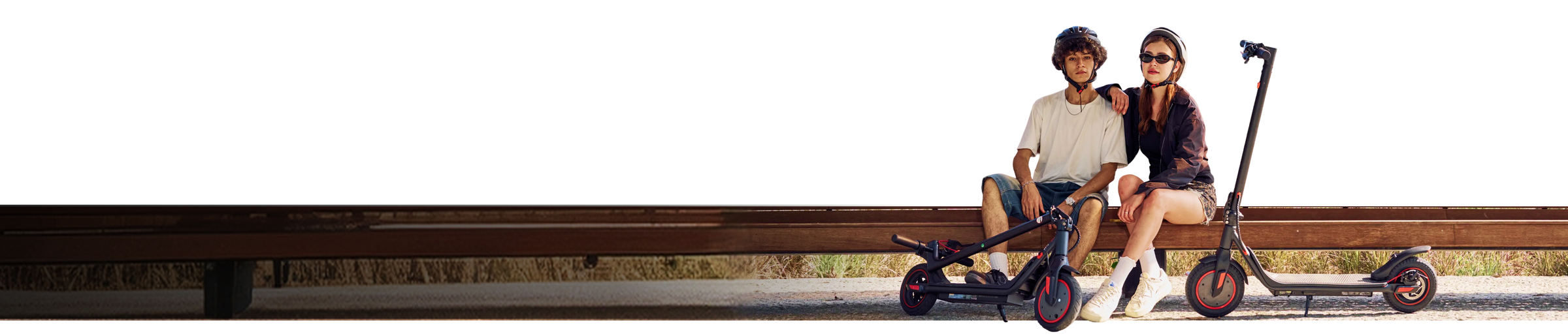 Two riders with an electric scooter